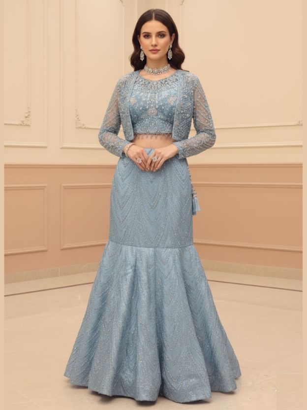 Woman wearing a light blue traditional outfit with a beige background